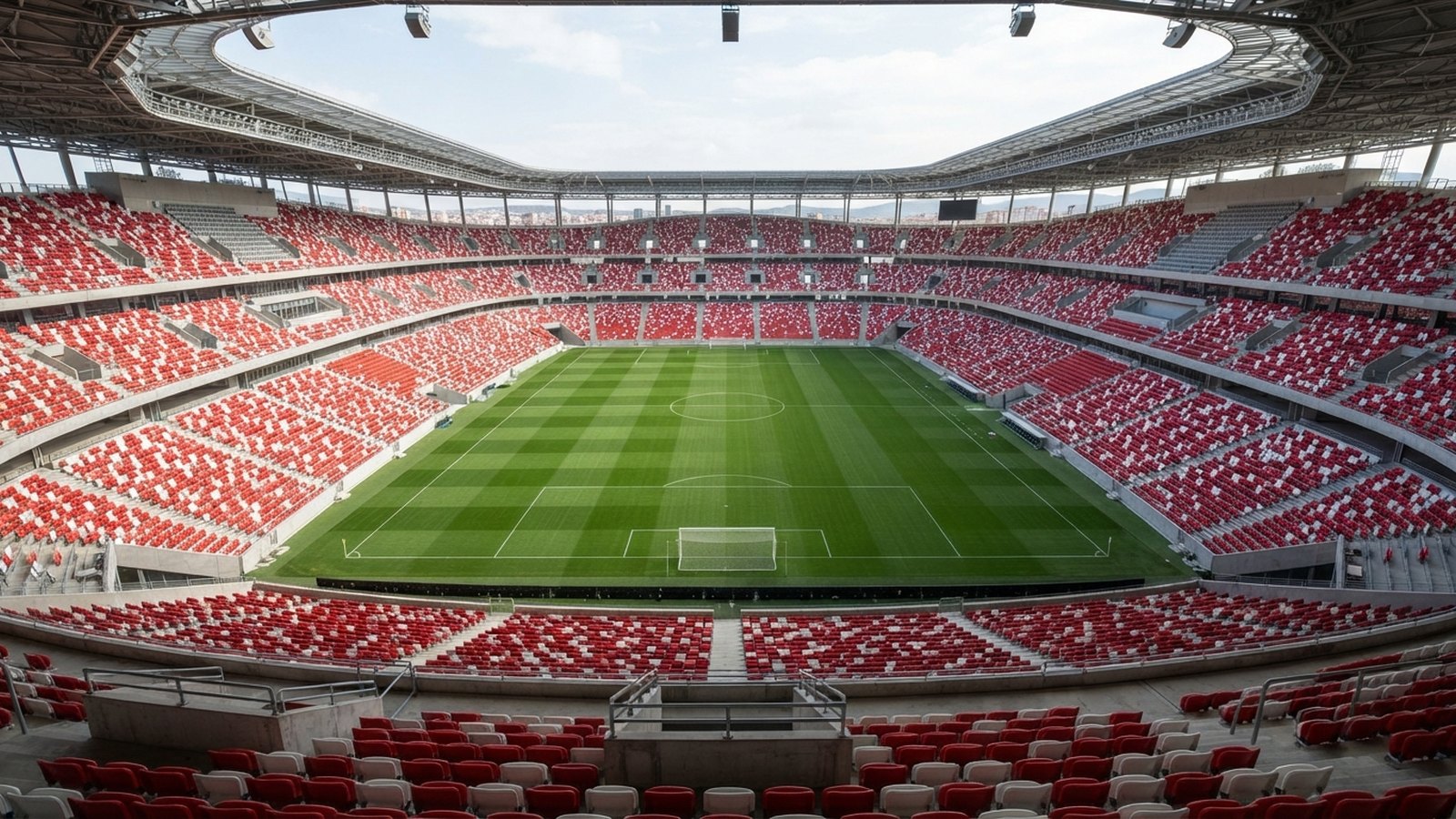 Prázdný moderní fotbalový stadion s červenobílými sedačkami